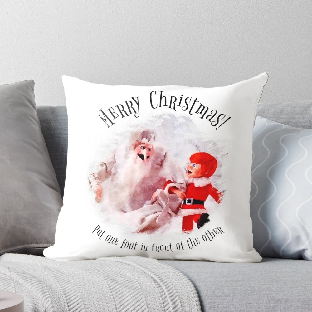 A festive Christmas pillow featuring the classic song "Put One Foot in Front of the Other" from the beloved Rankin/Bass holiday TV special.
