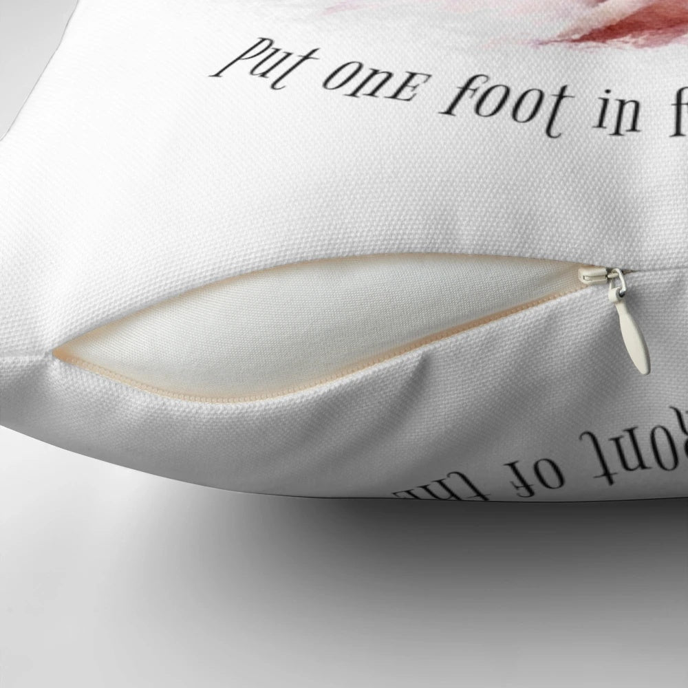 A festive Christmas pillow featuring the classic song "Put One Foot in Front of the Other" from the beloved Rankin/Bass holiday TV special.