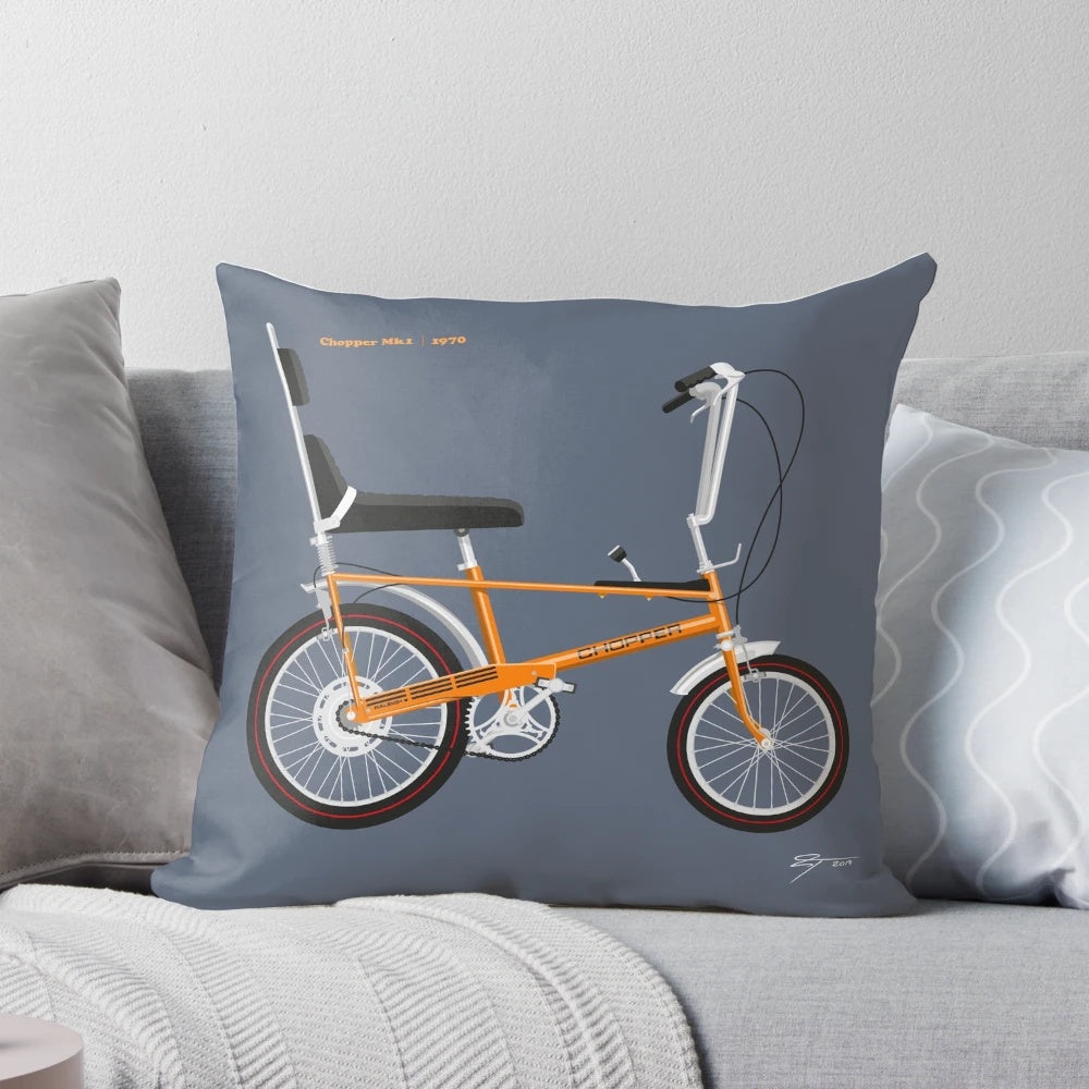 Vibrant orange Raleigh Chopper MK1 pillow with retro 70s design