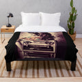 Retro movie plush blanket with classic cinema icons