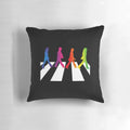 Colorful pillow featuring images of The Beatles band members and their iconic Abbey Road album cover