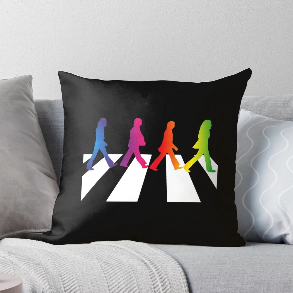 Colorful pillow featuring images of The Beatles band members and their iconic Abbey Road album cover