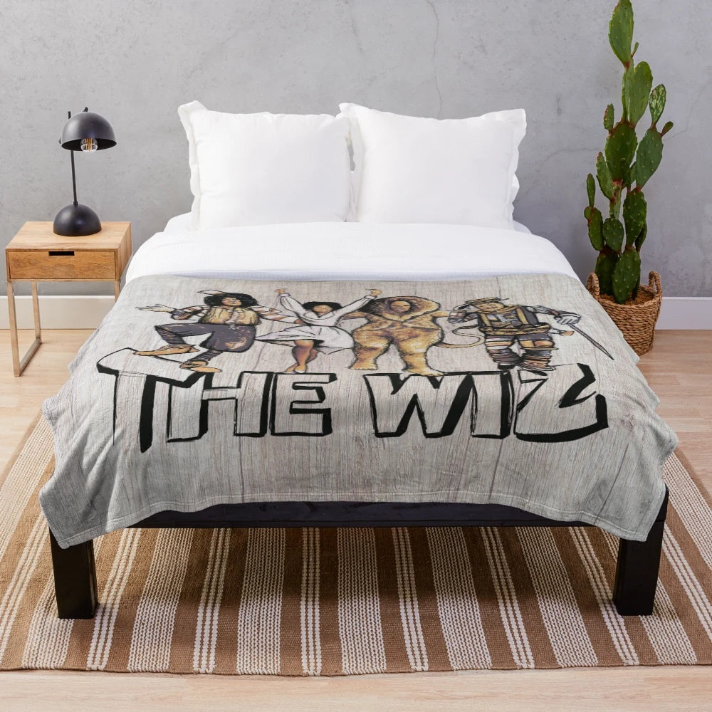 Plush blanket featuring The Wiz inspired design