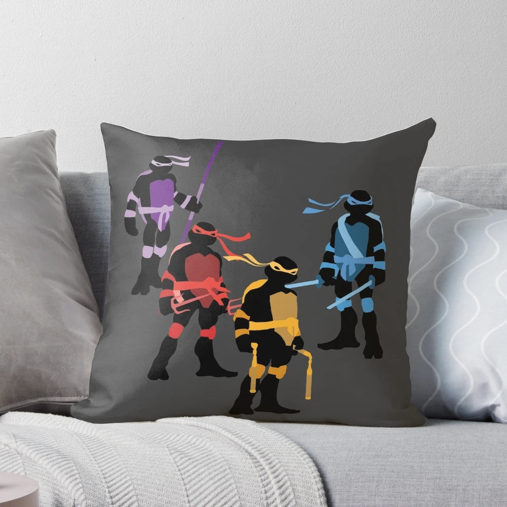 Pillow featuring the silhouettes of the four classic Teenage Mutant Ninja Turtles - Leonardo, Donatello, Michelangelo, and Raphael.