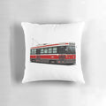 Pillow featuring an illustration of a classic Toronto streetcar in red, white, and grey.