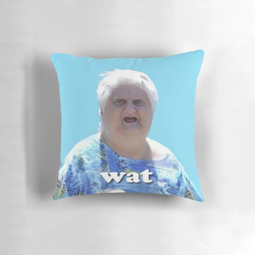 Pillow featuring the iconic "Wat" meme woman with a confused expression