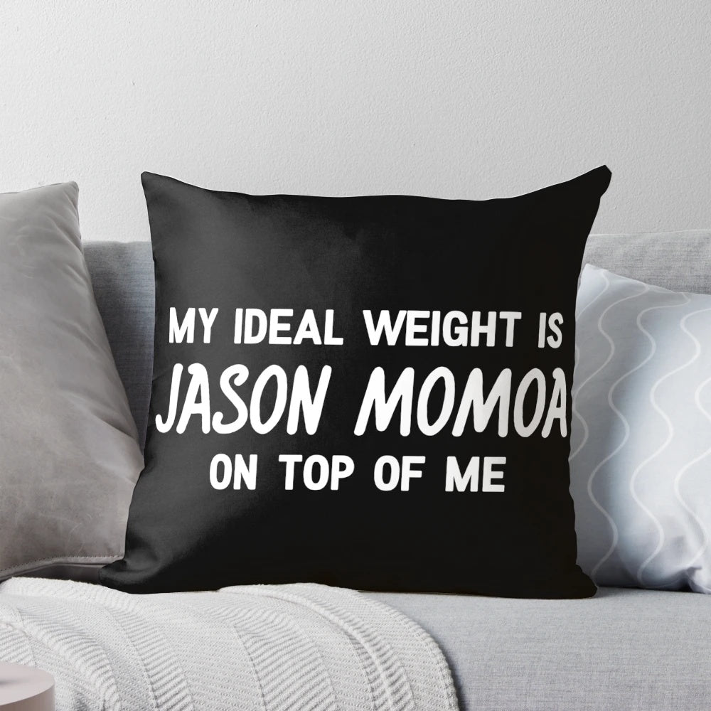 A soft, plush pillow featuring a playful design with the text "My Ideal Weight is Jason Momoa on Top of Me"