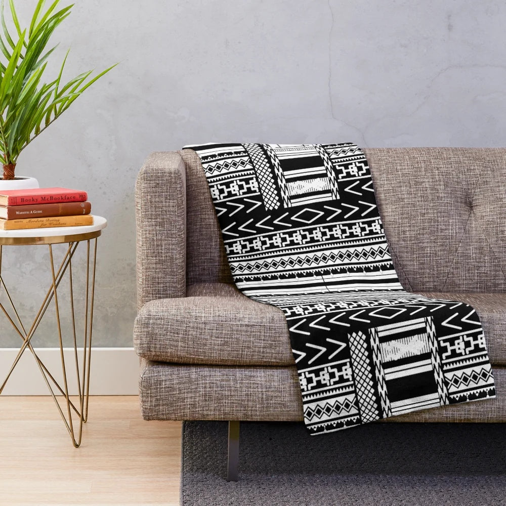 Ifugao-inspired black and white plush blanket with unique tribal patterns