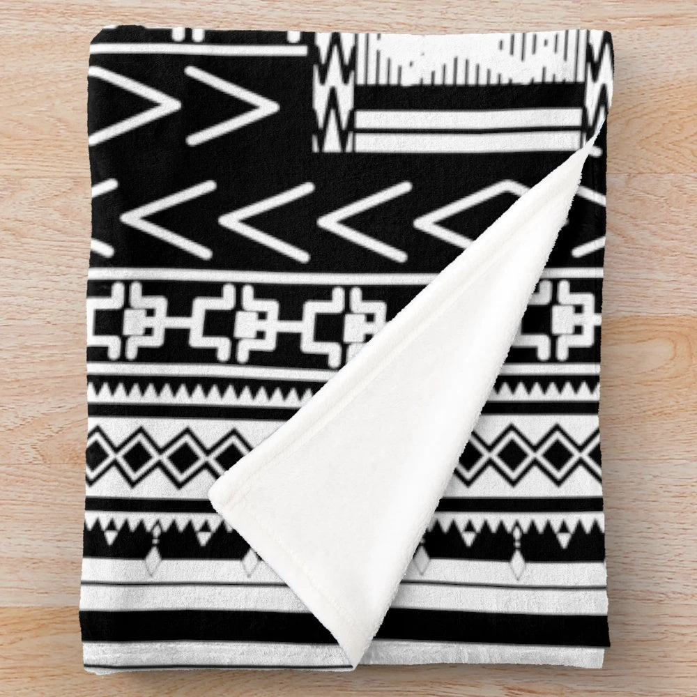 Ifugao-inspired black and white plush blanket with unique tribal patterns