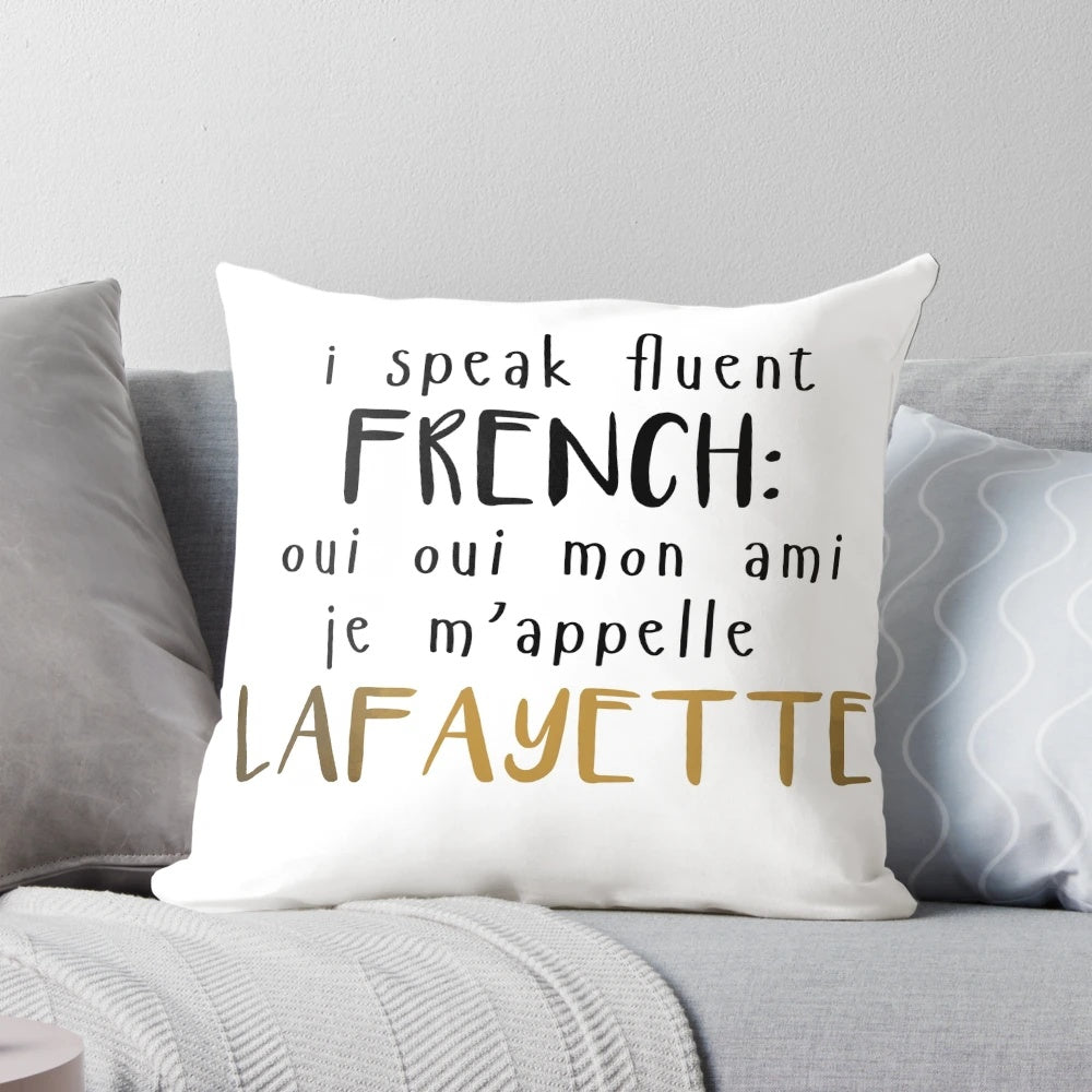 A fluffy white pillow with the words "Fluent French" printed on it, perfect for Hamilton fans and French language enthusiasts.
