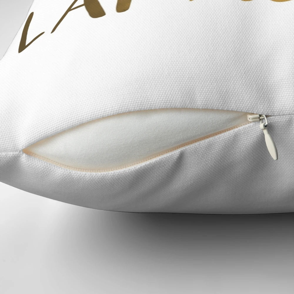 A fluffy white pillow with the words "Fluent French" printed on it, perfect for Hamilton fans and French language enthusiasts.