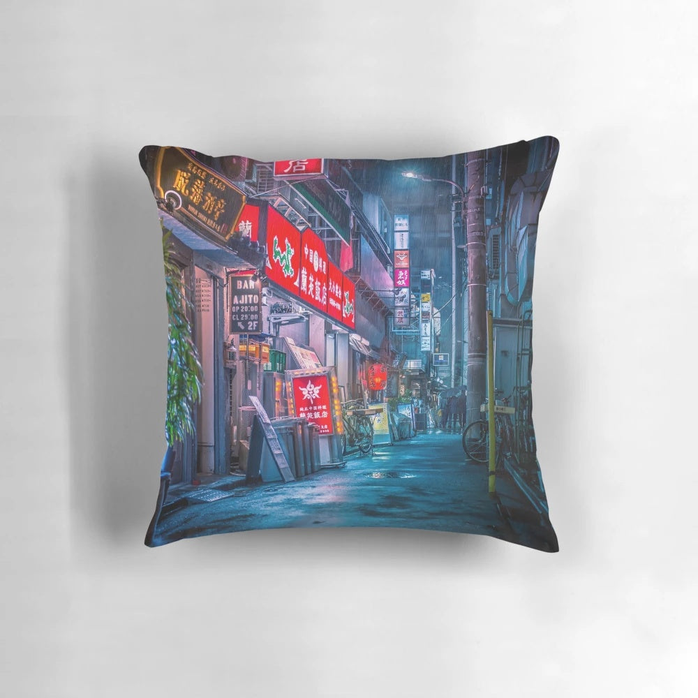 A pillow featuring a moody, neon-lit alleyway in the futuristic city of Neo Tokyo, capturing the cyberpunk aesthetic.