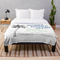 Plush blanket featuring tropical ocean and parrothead design