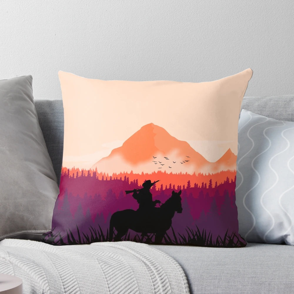 A vibrant sunset pillow featuring the iconic landscapes and characters from the Red Dead Redemption 2 video game.