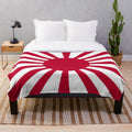 Imperial Japan inspired plush blanket with a rising sun design