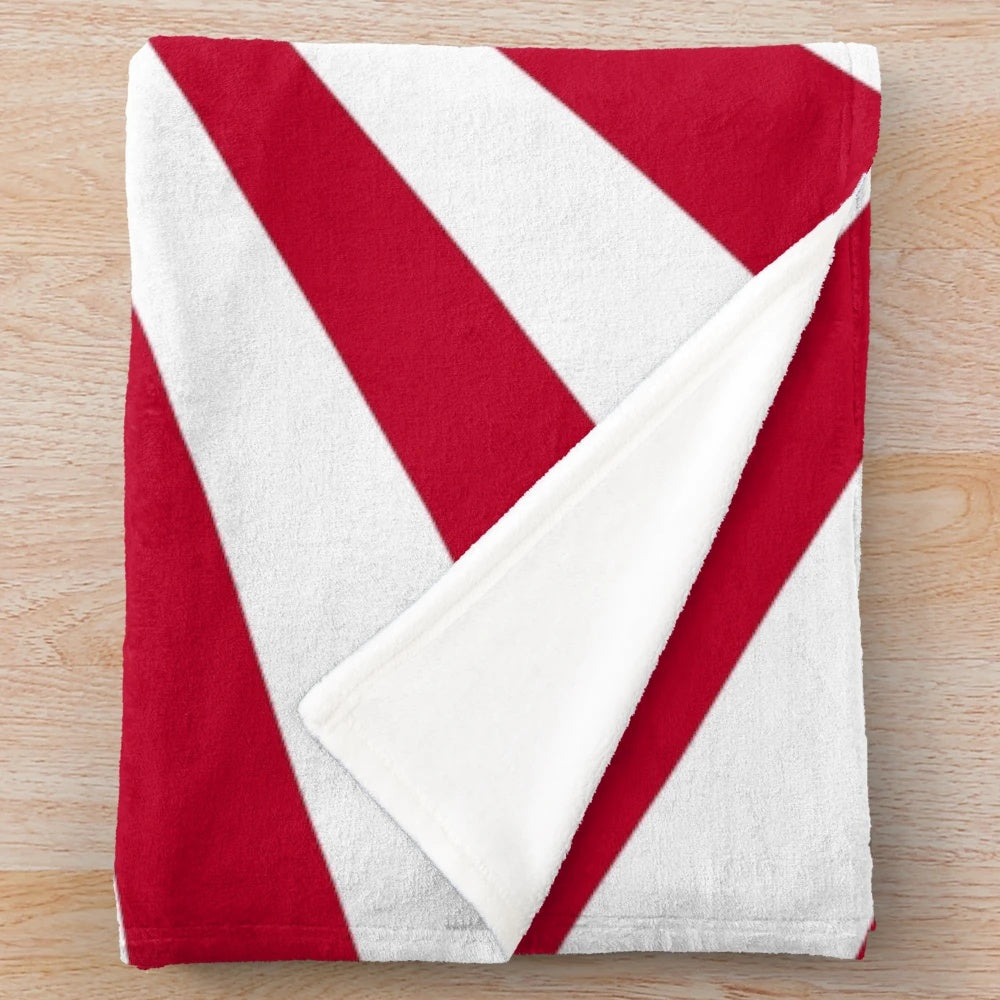 Imperial Japan inspired plush blanket with a rising sun design
