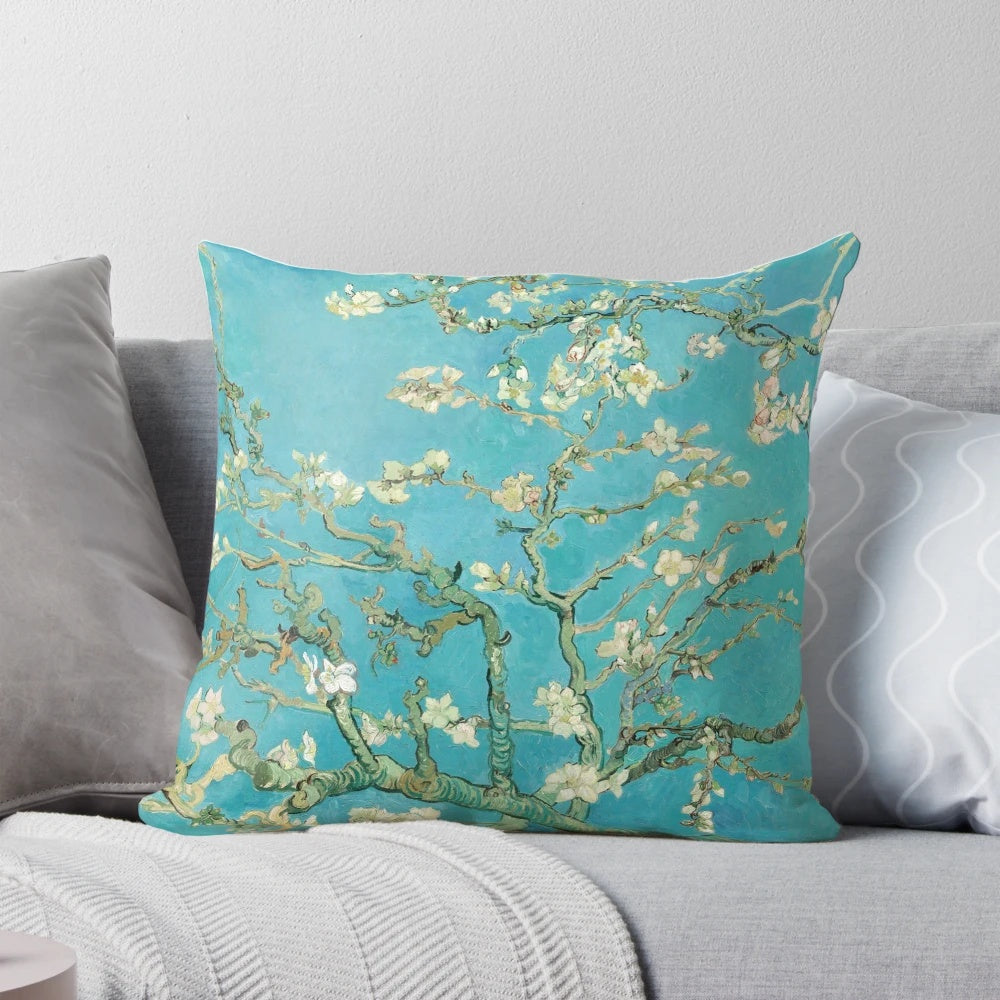 Decorative throw pillow featuring the impressionist painting "Almond Blossoms" by Vincent Van Gogh