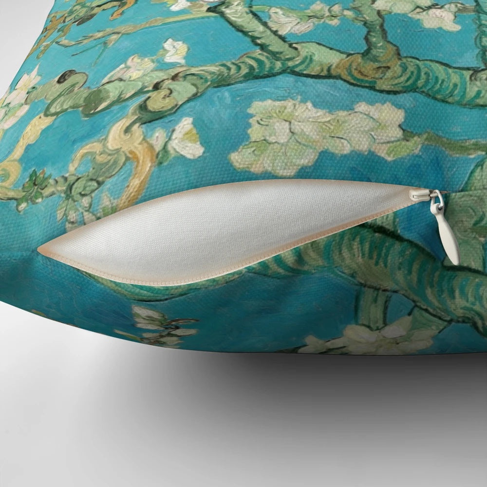 Decorative throw pillow featuring the impressionist painting "Almond Blossoms" by Vincent Van Gogh