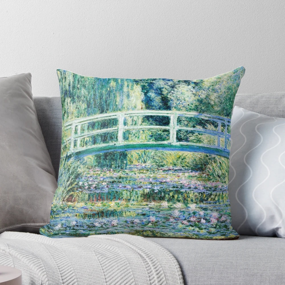 Monet's Water Lilies and Japanese Bridge oil painting reproduced on a decorative throw pillow.