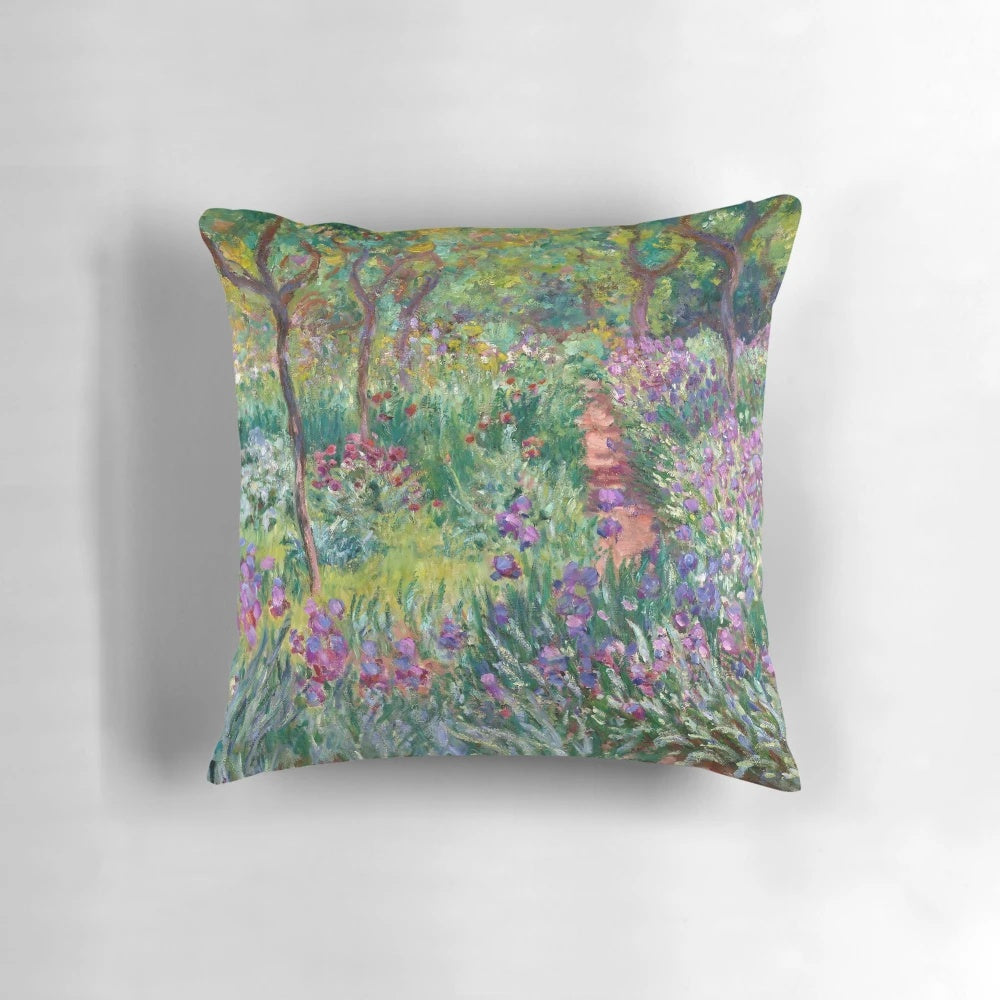 Vintage pillow featuring the impressionist painting "The Artist's Garden at Giverny" by Claude Monet