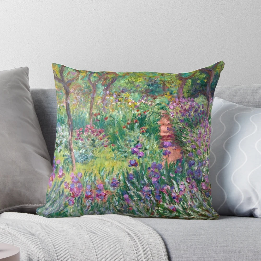 Vintage pillow featuring the impressionist painting "The Artist's Garden at Giverny" by Claude Monet