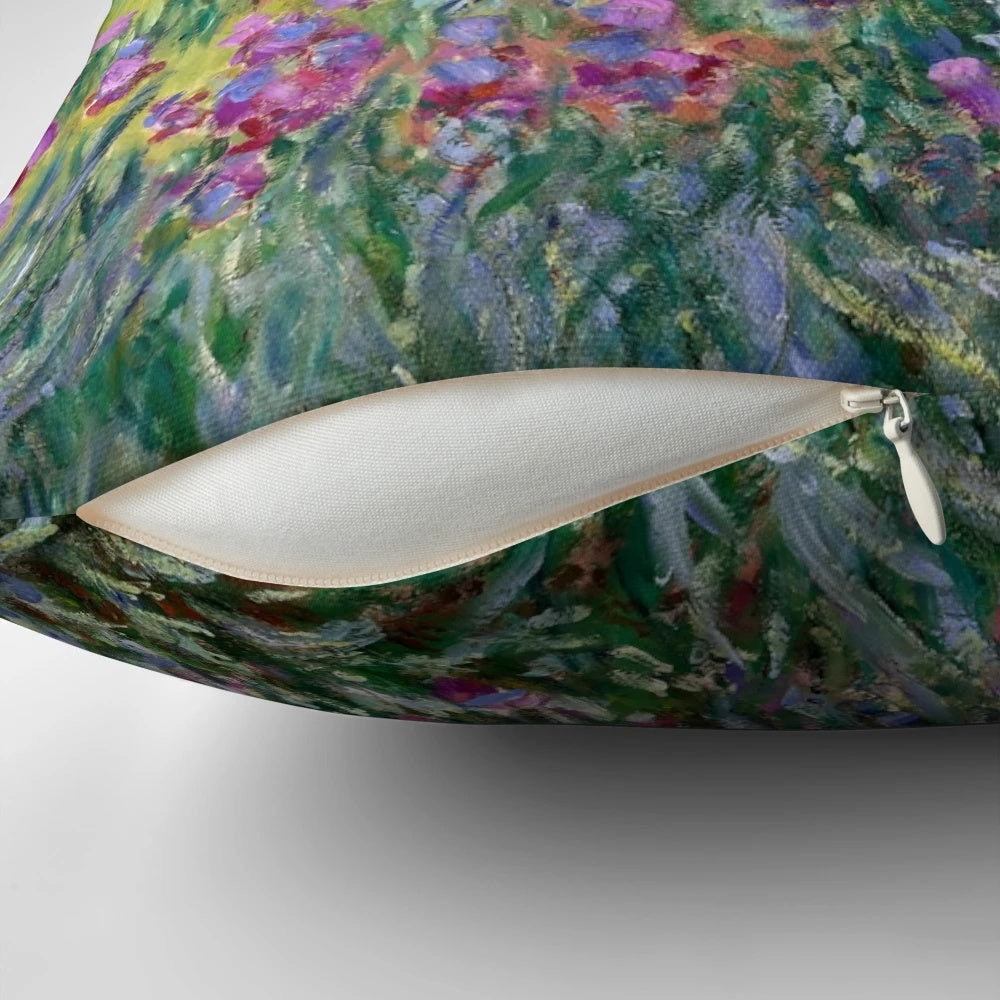 Vintage pillow featuring the impressionist painting "The Artist's Garden at Giverny" by Claude Monet