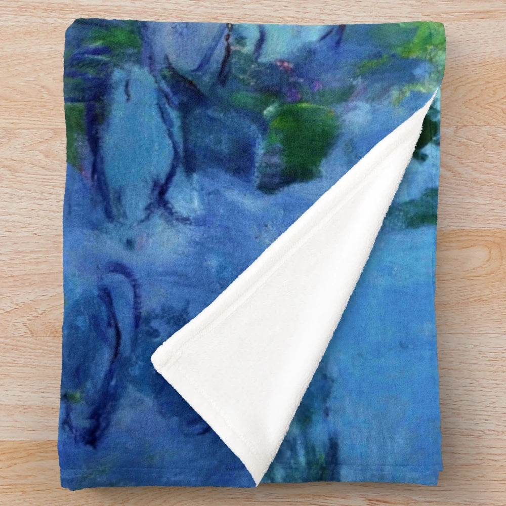 Plush blanket featuring Claude Monet's iconic water lily painting