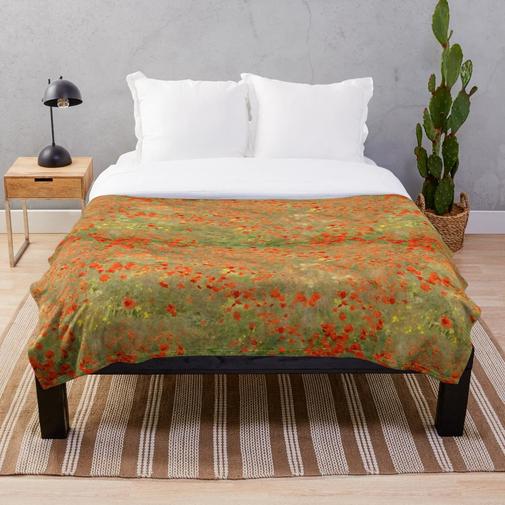 Plush blanket featuring Monet's famous "Poppy Field" impressionist painting