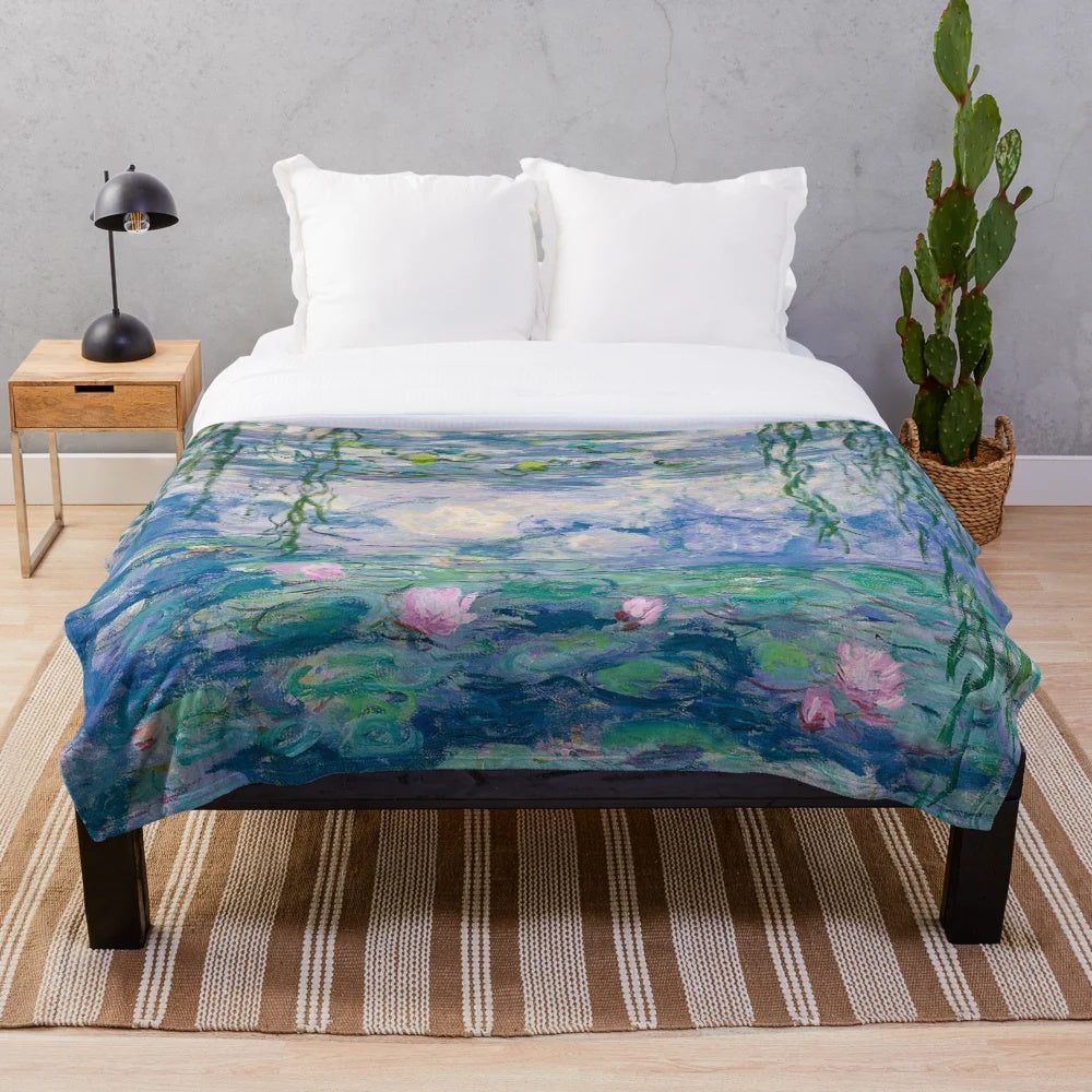 Plush blanket with Claude Monet's impressionist painting of water lilies