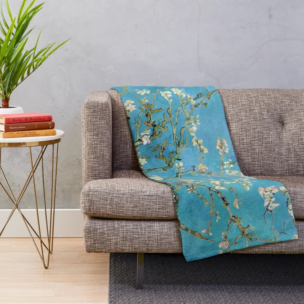 Plush blanket featuring a vintage-style print of Van Gogh's Almond Blossom painting