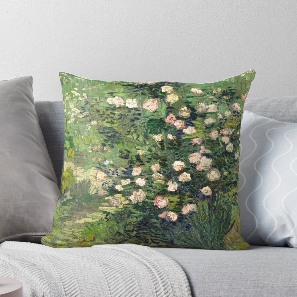 Vibrant floral pillow featuring the iconic "Roses" painting by renowned Impressionist artist Vincent van Gogh