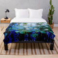 Plush blanket featuring Monet's 'Blue Water Lilies' painting
