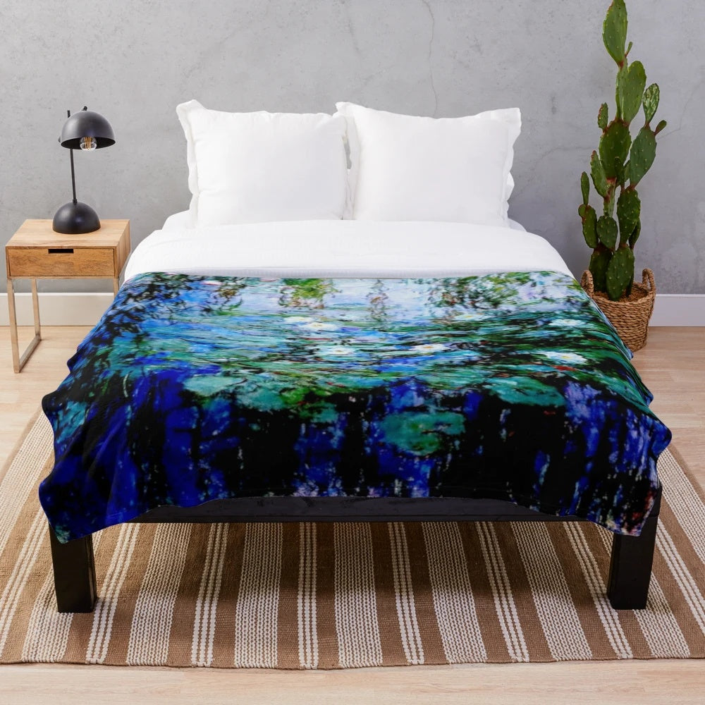 Plush blanket featuring Monet's 'Blue Water Lilies' painting