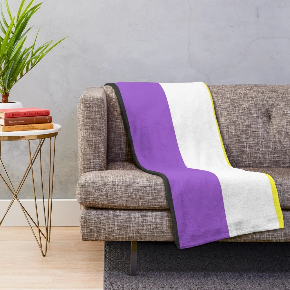Plush blanket with a seamless repeating non-binary pride flag pattern design