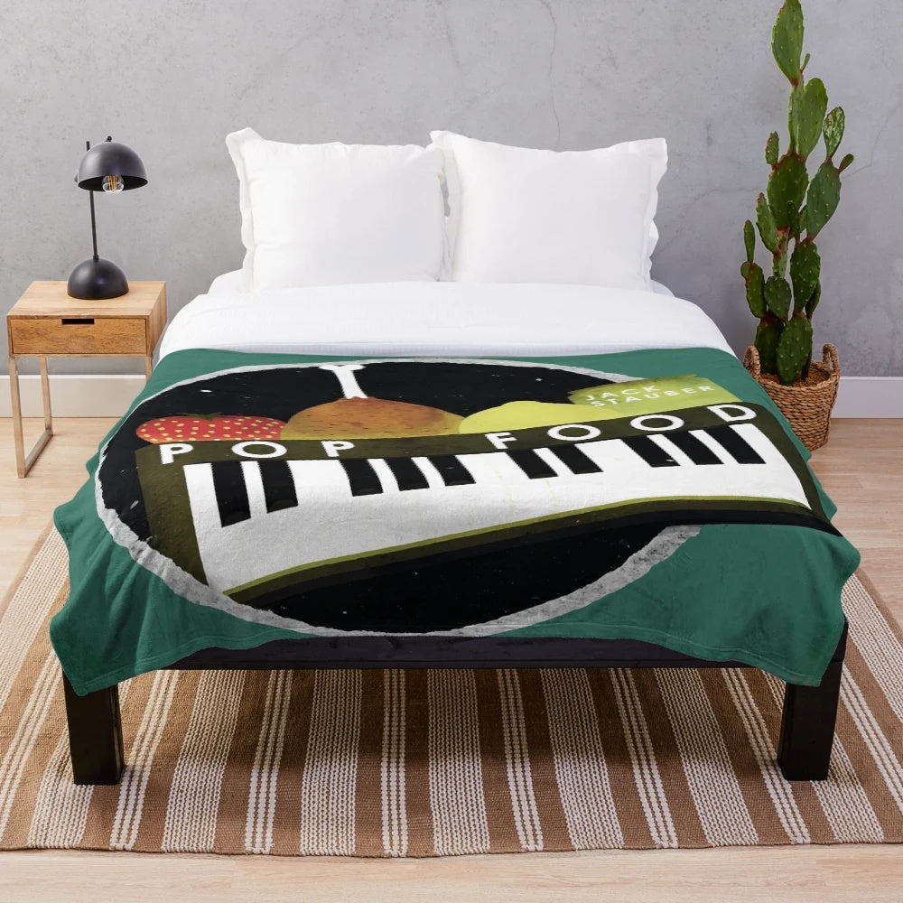 Plush blanket featuring the album cover art of Jack Stauber's 'Pop Food