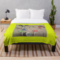 Soft plush blanket featuring the XTC band logo and indie rock music icons