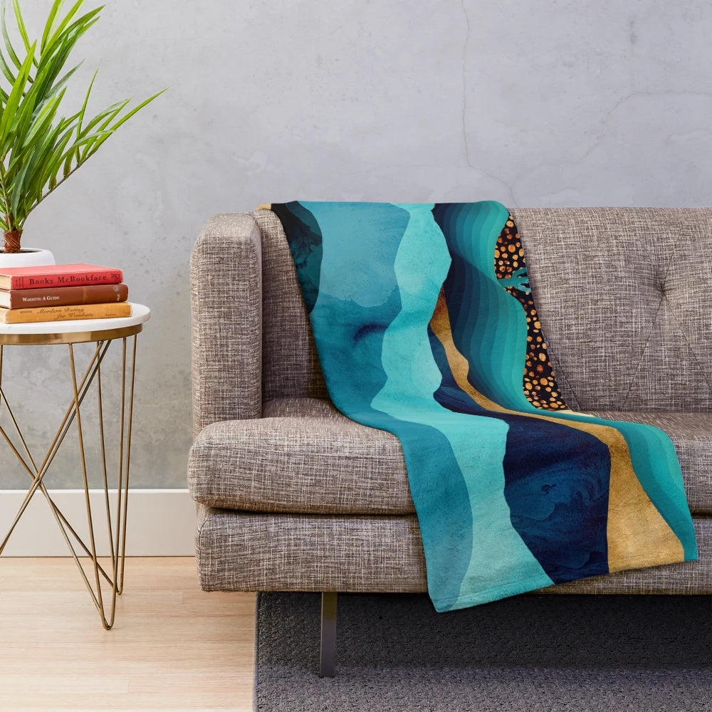 Indigo and navy blue plush blanket with desert night landscape design