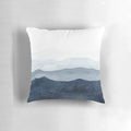 Indigo and blue watercolor abstract mountain landscape design on a modern decorative throw pillow