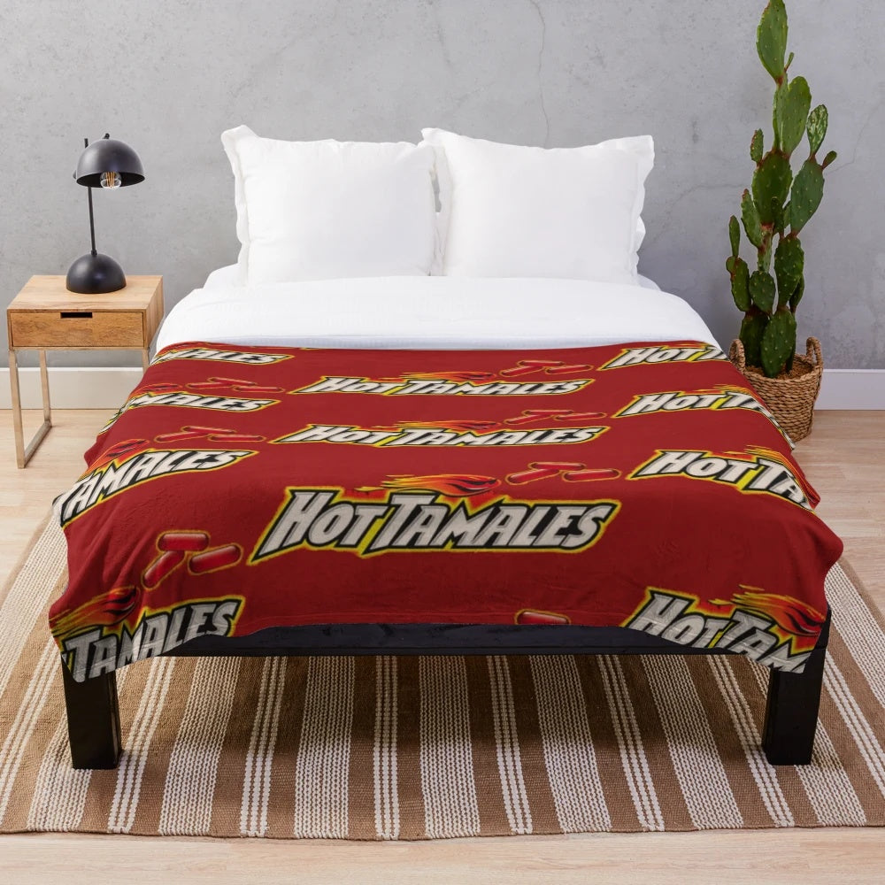 Hot Tamales Plush Blanket, featuring a soft and cozy design inspired by the popular sweet candy