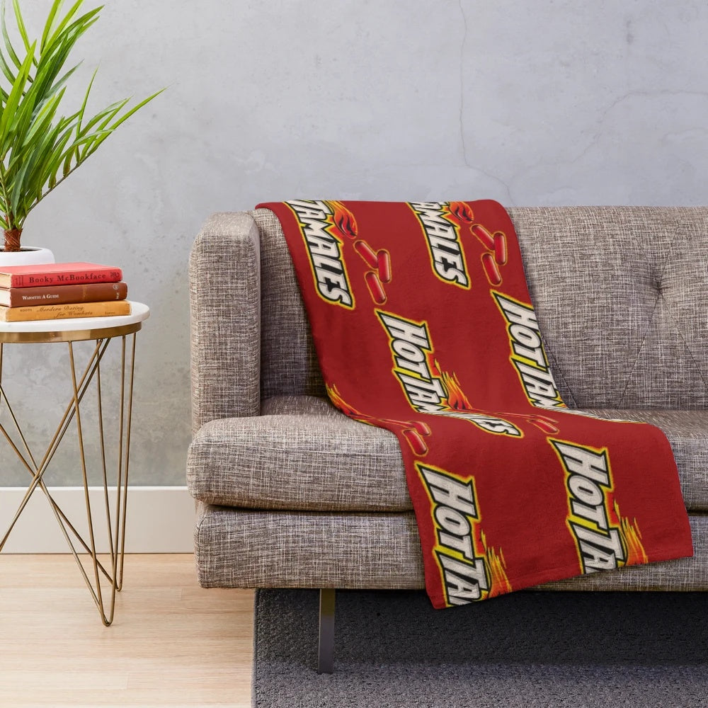 Hot Tamales Plush Blanket, featuring a soft and cozy design inspired by the popular sweet candy