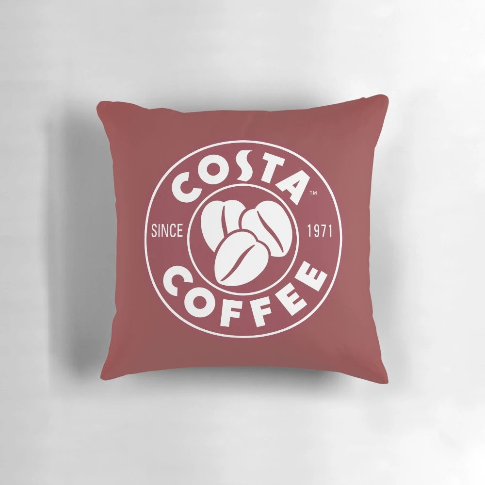 Soft and cozy pillow featuring the iconic Costa Coffee branding