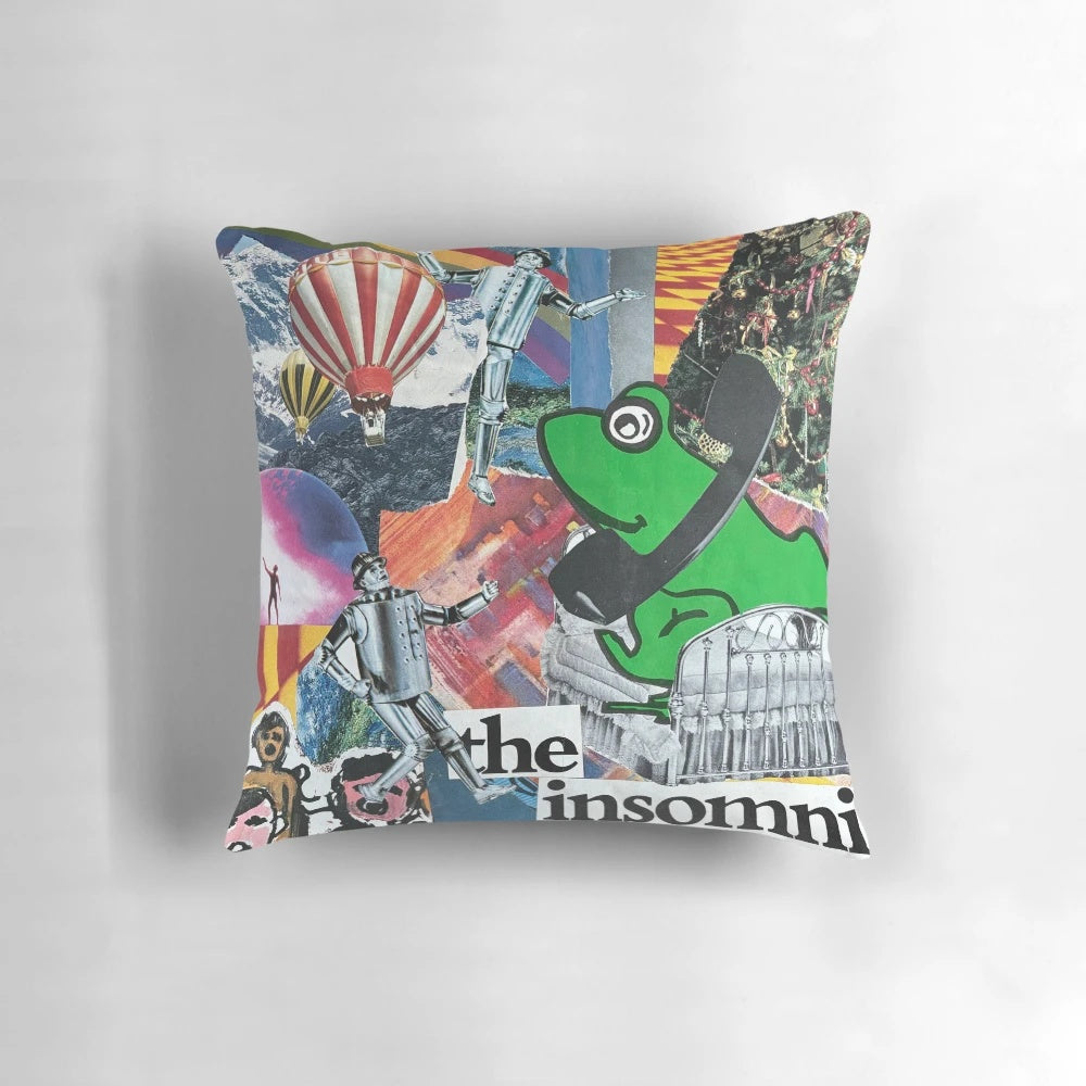 Colorful collage pillow with frogs, tin man, rubber duck, and other whimsical elements for insomniac decor