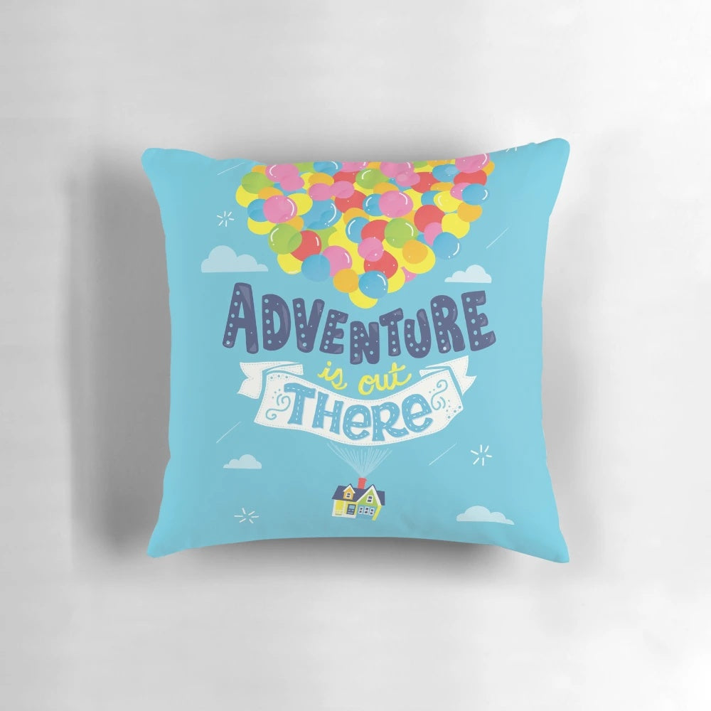 Decorative throw pillow with "Adventure is Out There" quote, perfect for travel-themed home decor