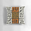 Decorative cream and auburn patterned pillow inspired by African Kuba fabric designs