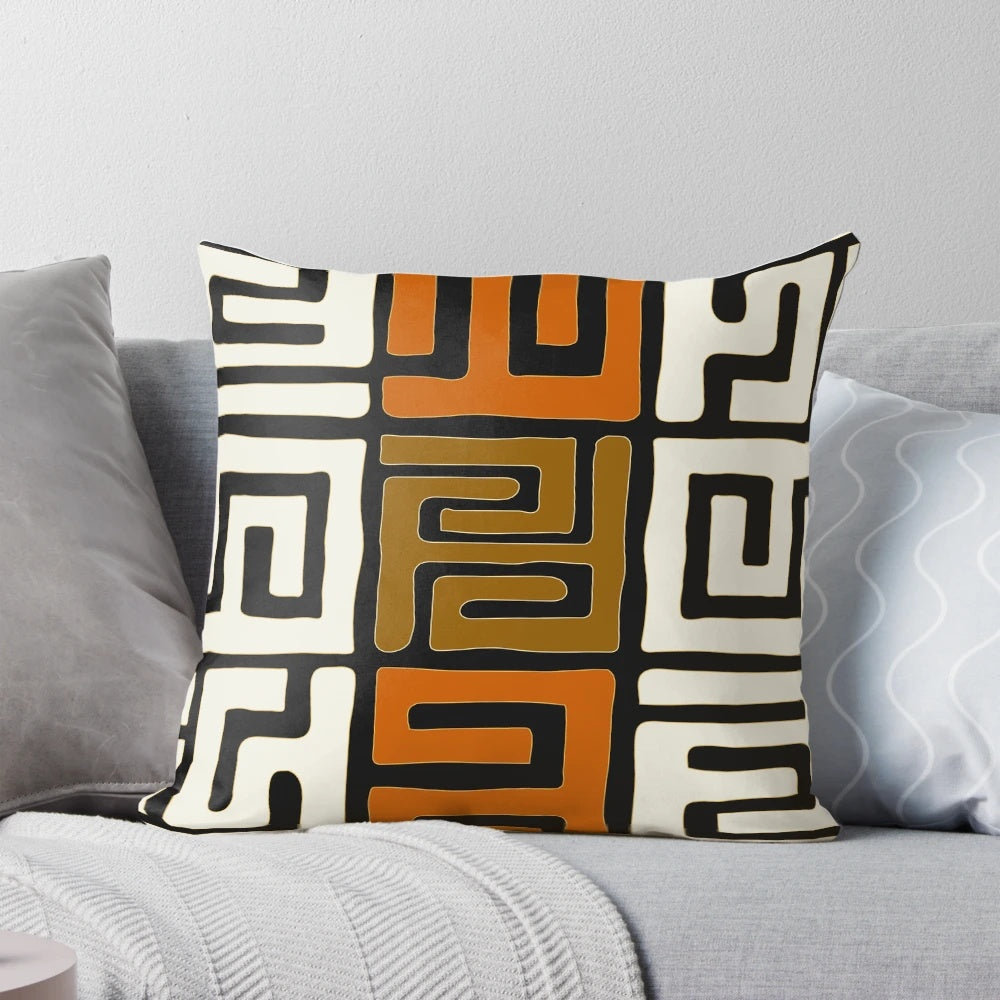 Decorative cream and auburn patterned pillow inspired by African Kuba fabric designs