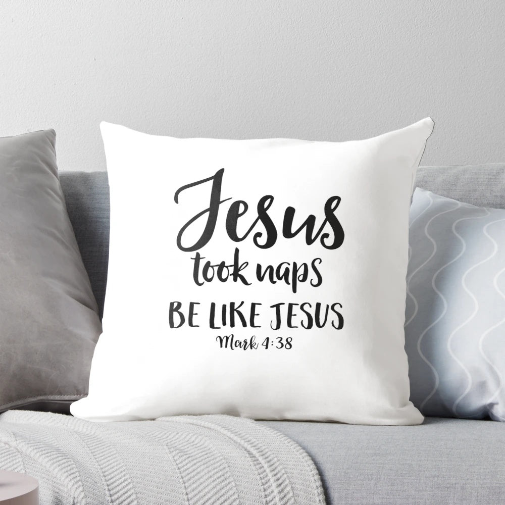 White throw pillow with the text "Jesus Took Naps Be Like Jesus" in a fun, hand-lettered style