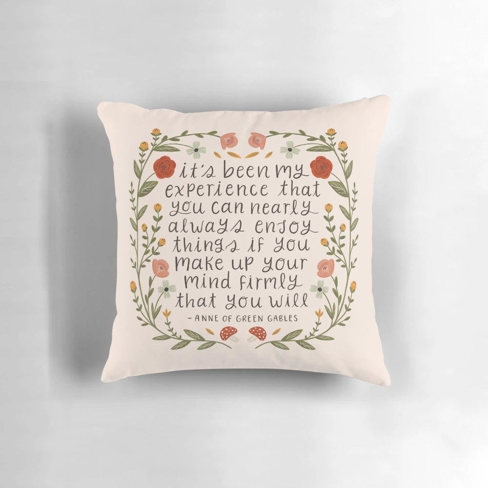 Floral throw pillow with "Enjoy Things" quote from Anne of Green Gables