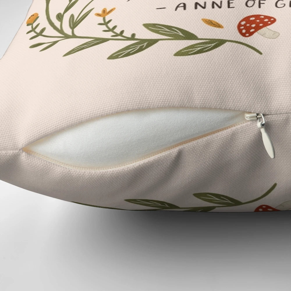 Floral throw pillow with "Enjoy Things" quote from Anne of Green Gables