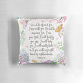 Decorative throw pillow featuring the Bible verse Isaiah 41:10 surrounded by a design of flowers and butterflies