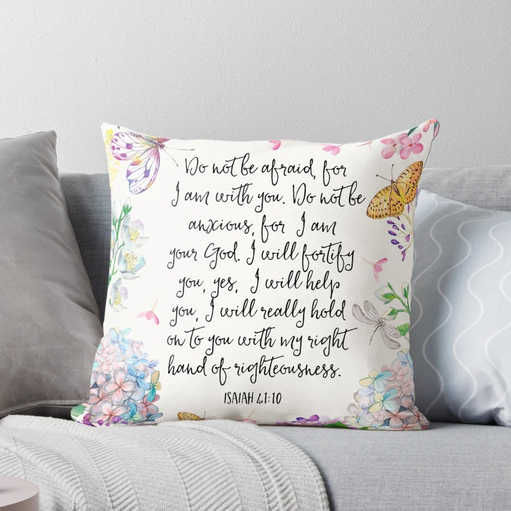 Decorative throw pillow featuring the Bible verse Isaiah 41:10 surrounded by a design of flowers and butterflies